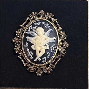 Gold Toned and Black Angel Cameo Brooch